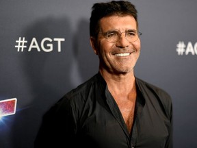 Simon Cowell attends "America's Got Talent" Season 14 Live Show Red Carpet at Dolby Theatre on September 17, 2019 in Hollywood, California.