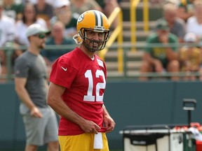 Aaron Rodgers of the Green Bay Packers works out during training camp at Ray Nitschke Field on July 28, 2021 in Ashwaubenon, Wisconsin.