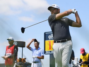 Canada's Corey Conners tees off during his second round of The British Open Golf Championship at Royal St. George's, Sandwich in south-east England on July 16, 2021.