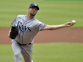Rich Hill of the Tampa Bay Rays pitches against the Atlanta Braves at Truist Park on July 18, 2021 in Atlanta.