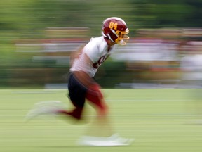 Washington Football Team wide receiver Dax Milne (84) runs a pass route during drills as part of minicamp at Inova Sports Performance Center.