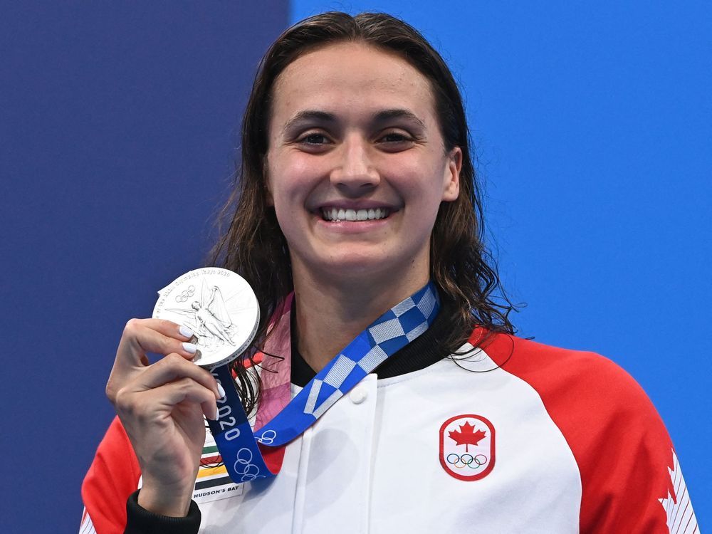 Kylie Masse returns home with three Olympic medals, resumes training