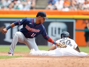 Detroit Tigers centre fielder Derek Hill steals second ahead of the tag by Minnesota Twins shortstop Jorge Polanco in the second inning  at Comerica Park.