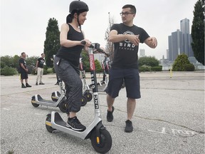 Bird Canada hosted a safe streets event on Thursday, July 8, 2021, in downtown Windsor. The event was designed to promote the responsible riding of the company's e-scooters and present basic operation techniques to new users. Here, Cheri Bradford gets some instruction from Bird technician Salikh Tursunov.