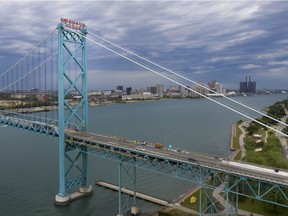 A bipartisan group of U.S. congressional members has petitioned President Biden to end travel restrictions at the U.S.-Canada border. The Ambassador Bridge is shown from the Canadian side on June 19, 2021.