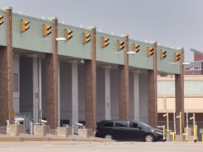 A motorist enters Windsor from Detroit via the Ambassador Bridge on Monday, July 19, 2021.