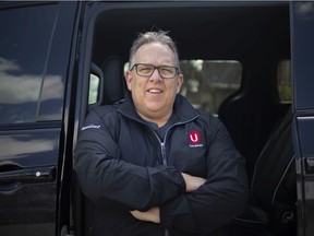 Dave Cassidy, president of Unifor Local 444 is pictured with his Chrysler Pacifica outside his home in Essex on Thursday, April 22, 2021.