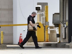 A Canada Border Services Agency employee is shown at the Windsor-Detroit tunnel inspection area on Tuesday, July 27, 2021.