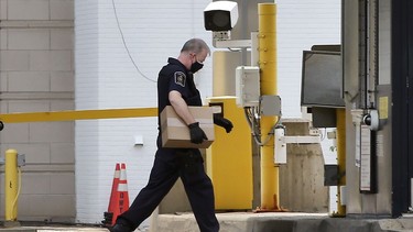 A Canada Border Services Agency employee is shown at the Windsor-Detroit tunnel inspection area on Tuesday, July 27, 2021.