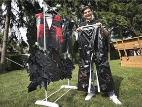 A tux with "deeper meaning." Ryan Bekic is shown on Tuesday, July 6, 2021, at his LaSalle home with the elaborate duct tape tuxedo he made. He has won $10,000 towards his university education in a contest.