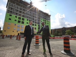 "We have a housing crisis in Windsor-Essex." MP Irek Kusmierczyk (L — Windsor-Tecumseh), left, and federal Minister of Families, Children and Social Development Ahmed Hussen are shown at a news conference in Windsor on Friday, July 30, 2021.