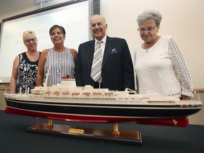 Sisters Nancy Travenetti, left, and Linda Pataky are shown with their parents John and Lia Viecelli at the Hotel-Dieu Grace Healthcare on Monday, July 26, 2021. Viecelli donated $100,000 towards a rehabilitation room at the facility. The hospital presented a replica of the ship that Viecelli travelled on as a teenager to come to Canada from Italy.