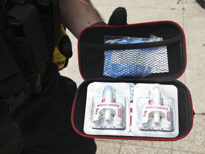  A Windsor Police Service officer displays a naloxone kit on Tuesday, July 20, 2021.