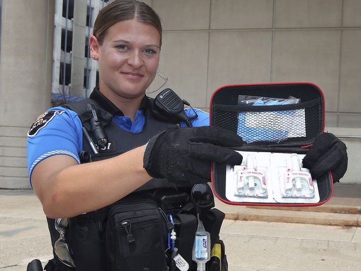  Windsor Police Service Const. Chelsey Drouillard displays a naloxone kit on Tuesday, July 20, 2021 in front of the downtown headquarters.