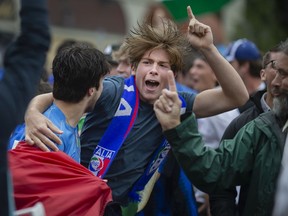Italy fans celebrate a goal by Italy in the Euro 2020 Final against England on Sunday, July 11, 2021, while watching in via Italia on Erie Street East.  Italy defeated England 3-2 on penalties.