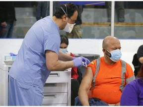 As many as 1,500 people were vaccinated with Pfizer-BioNTech COVID-19 vaccine on Wednesday at the Humber River Hospital Vaccination Clinic held at Downsview Arena on Wednesday April 21, 2021. Jack Boland/Toronto Sun/Postmedia Network