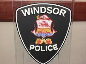 Windsor Police Service insignia on a podium at headquarters.