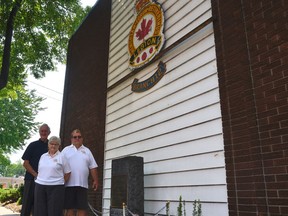 Bob and Bonnie Drago (left, centre), representatives on Royal Canadian Legion Branch 12 seniors and visitation committees, and Jim Blazek, president of Royal Canadian Legion Branch 12, outside the Walkerville East Windsor branch on July 31, 2021. The legion branch in the heart of Walkerville closed its doors Monday.