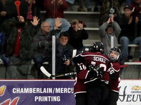 Chatham Maroons' Griffin Robinson (16), Eddie Schulz (19) and Matt Murray (55) celebrate Robinson's goal in the second overtime against the Sarnia Legionnaires at Chatham Memorial Arena in Chatham, Ont., on Sunday, Jan. 13, 2019. Mark Malone/Chatham Daily News/Postmedia Network