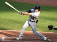 Jacob Robson #74 of the Detroit Tigers swings in his major league debut against the Baltimore Orioles at Oriole Park at Camden Yards on August 12, 2021 in Baltimore, Maryland.