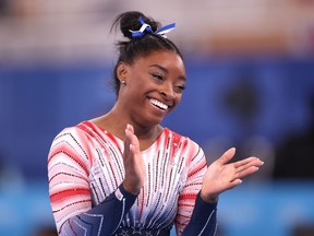 TOKYO, JAPAN - AUGUST 03: Simone Biles of Team United States reacts during the Women's Balance Beam Final on day eleven of the Tokyo 2020 Olympic Games at Ariake Gymnastics Centre on August 03, 2021 in Tokyo, Japan.