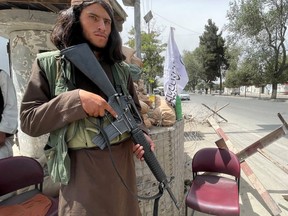 A member of Taliban forces keeps watch at a checkpost in Kabul, Afghanistan Aug. 17, 2021.