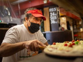 Bob Abumeeiz of Windsor's Arcata Pizzeria prepares a pie on Aug. 12, 2021. Arcata is one of the pizzerias featured in a new Windsor pizza documentary, The Pizza City You've Never Heard Of.
