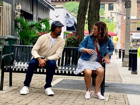 Actors Nadeem Phillip (left) and Meaghen Quinn (right) perform a CONTACT performance in downtown Windsor on August 11, 2021.