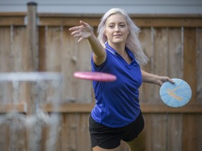 Chantel Budinsky works on her disc golf technique in her backyard, on Tuesday, August 24, 2021, after coming in third in the PDGA Amateur World Championships. PHOTO BY DAX MELMER /Windsor Star