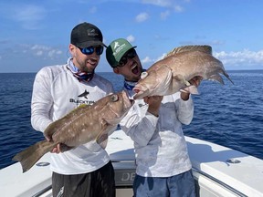 Windsor-raised brothers Jake and Josh Jorgensen goof around with a couple catches. The Jorgensens' YouTube channel, BlacktipH, is the most popular fishing channel in the world, with more than a billion total views.