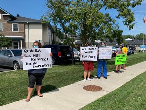 Employees of Iler Lodge, represented by CUPE Local 1370, rally over pay problems outside the long-term care home and senior living facility in Essex, Ontario. Photographed Aug. 25, 2021.
