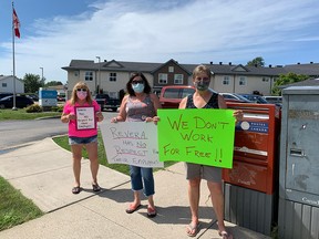 Employees of Iler Lodge, represented by CUPE Local 1370, rally over pay problems outside the long-term care home and senior living facility in Essex, Ontario. Photographed Aug. 25, 2021.
