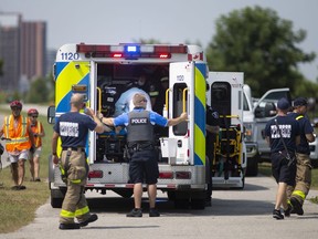 Emergency crews respond to a person in the water in the Detroit River at the base of Hall Avenue on Thursday, August 5, 2021.  One person was taken to hospital with unknown injuries.