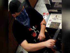 Security camera image of a man who robbed a business in the 2200 block of Huron Church Road in Windsor during the early morning hours of Aug. 2, 2021.