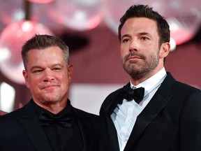 Matt Damon, left, and Ben Affleck arrive for the screening of the film "The Last Duel" presented out of competition on Sept. 10, 2021 during the 78th Venice Film Festival at Venice Lido.