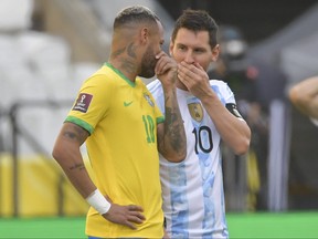 Brazil's Neymar, left, and Argentina's Lionel Messi talk before their South American qualification football match for the FIFA World Cup Qatar 2022 at the Neo Quimica Arena, also known as Corinthians Arena, in Sao Paulo, Brazil, on Sept. 5, 2021.