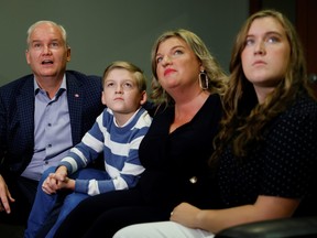 Conservative Party Leader Erin O'Toole along with wife Rebecca and children Jack and Mollie, watch early election results in Oshawa September 20, 2021.