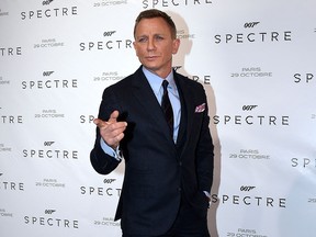 In this file photo taken on October 29, 2015, Daniel Craig poses during the French premiere of the new James Bond film 'Spectre' in Paris.