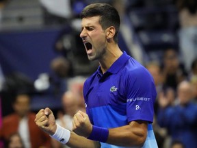 Novak Djokovic celebrates after winning his U.S. Open semifinal match against Alexander Zverev at USTA Billie Jean King National Tennis Center in New York City, Friday, Sept. 10, 2021.