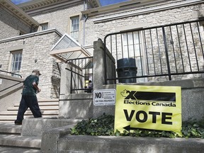 A man makes his way into Mackenzie Hall in Windsor on Friday, September 10, 2021, where an advance polling station was open for the federal election.