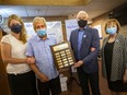 From left, Sally Bennett Olczak, Alzheimer Society of Windsor-Essex County CEO, Generosity of Spirit Award recipients, Don Martel and Jim Scott, and board chair, Karen Hall, are pictured during the presentation of the awards on Tuesday, Sept. 21, 2021.