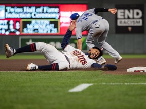 Minnesota Twins center fielder Byron Buxton advances to third base on a pickoff error by Toronto Blue Jays relief pitcher Thomas Hatch (not pictured) during the fourth inning at Target Field.