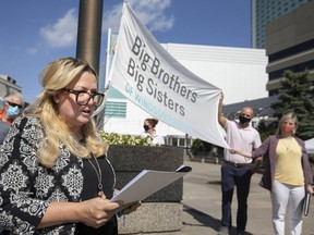 It takes a village to raise a child. Becky Parent, executive director of Big Brothers Big Sisters of Windsor Essex, speaks during a flag-raising ceremony to celebrate Big Brothers Big Sisters Month, at Charles Clark Square in downtown Windsor, on Friday, Sept. 17, 2021.