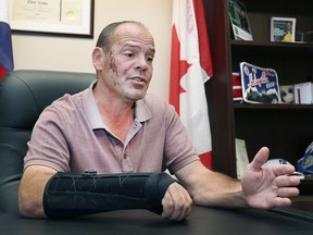 MP Chris Lewis is shown in his constituency office in Essex on Thursday, September 23, 2021. The re-elected member of parliament suffered significant injuries when he was thrown from a horse on election day.