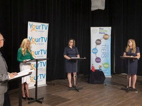 The debate between candidates in the Essex riding proceeded Friday without Conservative incumbent Chris Lewis.  From left, moderator Craig Pearson from the Windsor Star, Green Party candidate Nancy Pancheshan, Liberal Audrey Festeryga  
and Tracey Ramsey of the NDP take part in the debate.