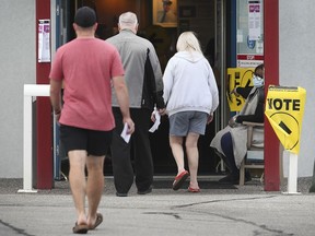 Voters head into the Windsor Yatch Club on Monday, September 20, 2021 to vote in the federal election.