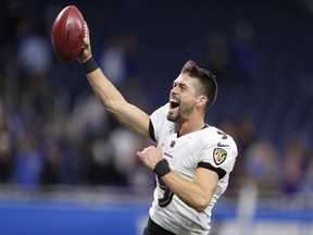 Baltimore Ravens kicker Justin Tucker (9) celebrates while leaving the field after defeating the Detroit Lions at Ford Field in Detroit, Sept. 26, 2021.