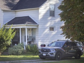 A LaSalle police cruiser sits parked outside a home at 2239 Front Rd. in LaSalle as police investigate the death of a male, on Tuesday, Sept. 28, 2021.