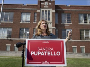 Sandra Pupatello, Liberal candidate for Windsor West MP, speaks in front of the former J.L. Forster Secondary School in Windsor's west end on Sept. 7, 2021.