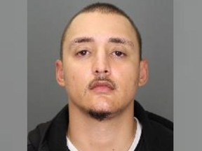 Windsor Police are looking for Aaron Evans, 30, who is considered armed and dangerous.